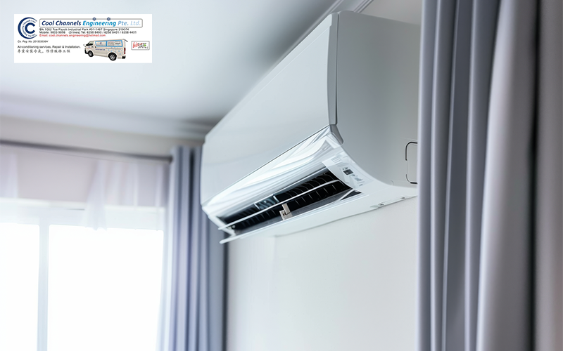 Wall-mounted indoor aircon unit installed in a small bedroom.